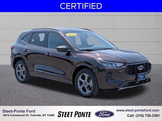 2023 Ford Escape ST-Line in Cinnabar Red — front three-quarter view