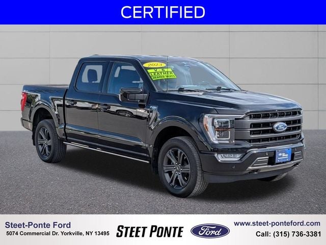 2023 Ford F-150 Lariat in Agate Black Metallic — front three-quarter view