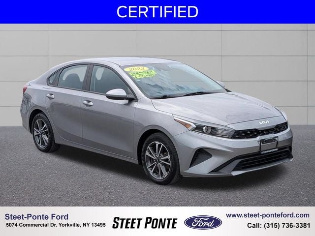 2023 Kia Forte LXS in Steel Gray — front three-quarter view