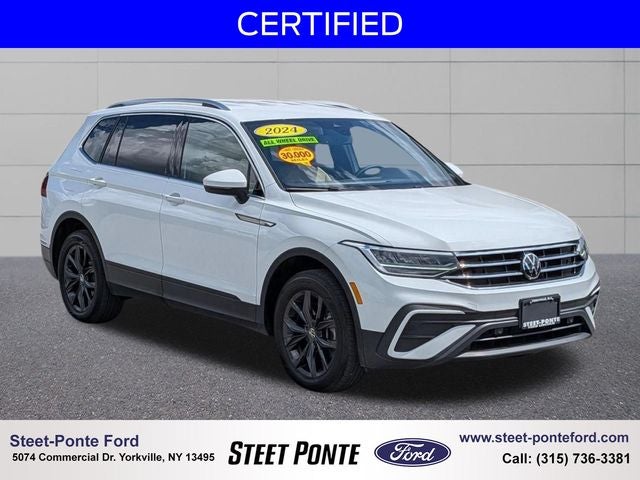 2024 Volkswagen Tiguan 2.0T SE in Pure White — front three-quarter view