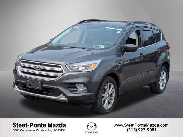 2018 Ford Escape SE in Magnetic — front three-quarter view