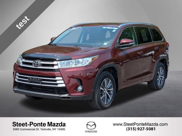 2017 Toyota Highlander XLE in Ooh La La Rouge Mica — front three-quarter view