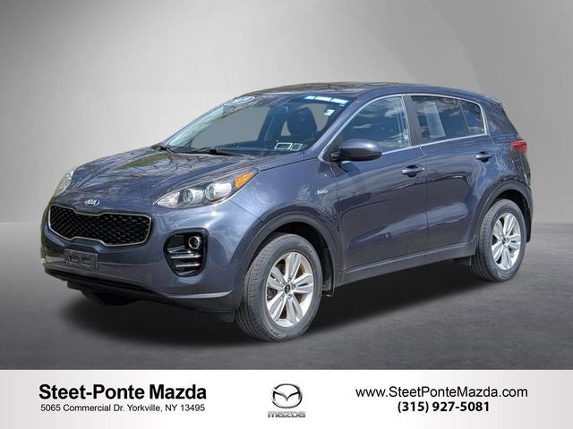 2019 Kia Sportage LX in Pacific Blue — front three-quarter view